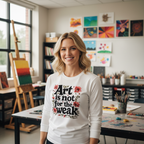 Female art teacher wearing Art is Not for the Weak white tee