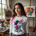 Teen girl wearing Currently in my Paint Era white long sleeve tee in art studio