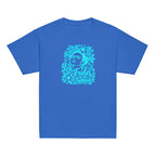 A royal blue short-sleeve crewneck t-shirt featuring a bright cyan graphic on the chest of Frida Kahlo's face surrounded by flowers and the text 'Oh Frida GIVE ME COURAGE'.